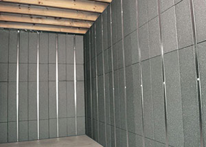SilverGlo™ insulation and metal studs making up our Basement to Beautiful™ panels.